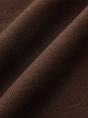 Asymmetric Belted Curved-Leg Pants